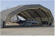 Lockheed Martin F-16AM FA-94, flagship of No. 31 "Tiger" Squadron of the 10th Tactical Wing at Kleine-Brogel Air Base in one of the four field aircraft shelters at the QRA area of iauliai Air Base. Click to enlarge.