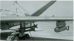 Fouga met 5 inch raketten en bom van 50 kg.