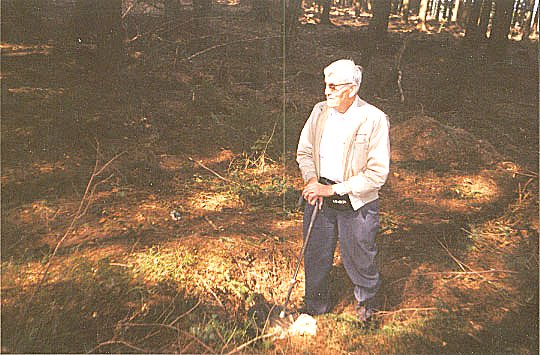 ALFRED KNAACK STANDING IN HIS FOXHOLE